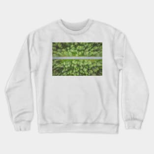 Empty straight road through the forest top down aerial view Crewneck Sweatshirt